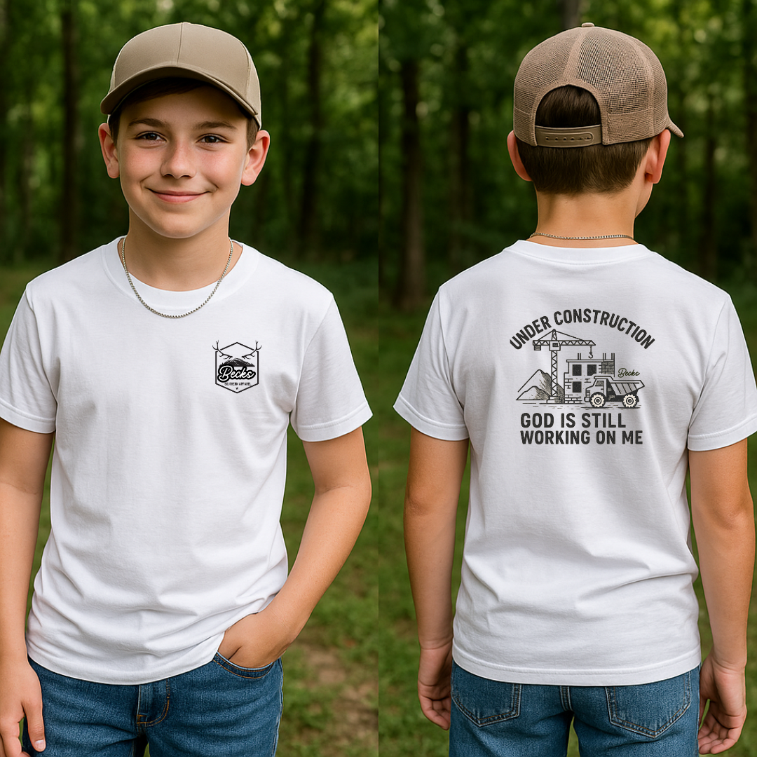 👷 Under Construction Kids Tee – “God Is Still Working on Me”